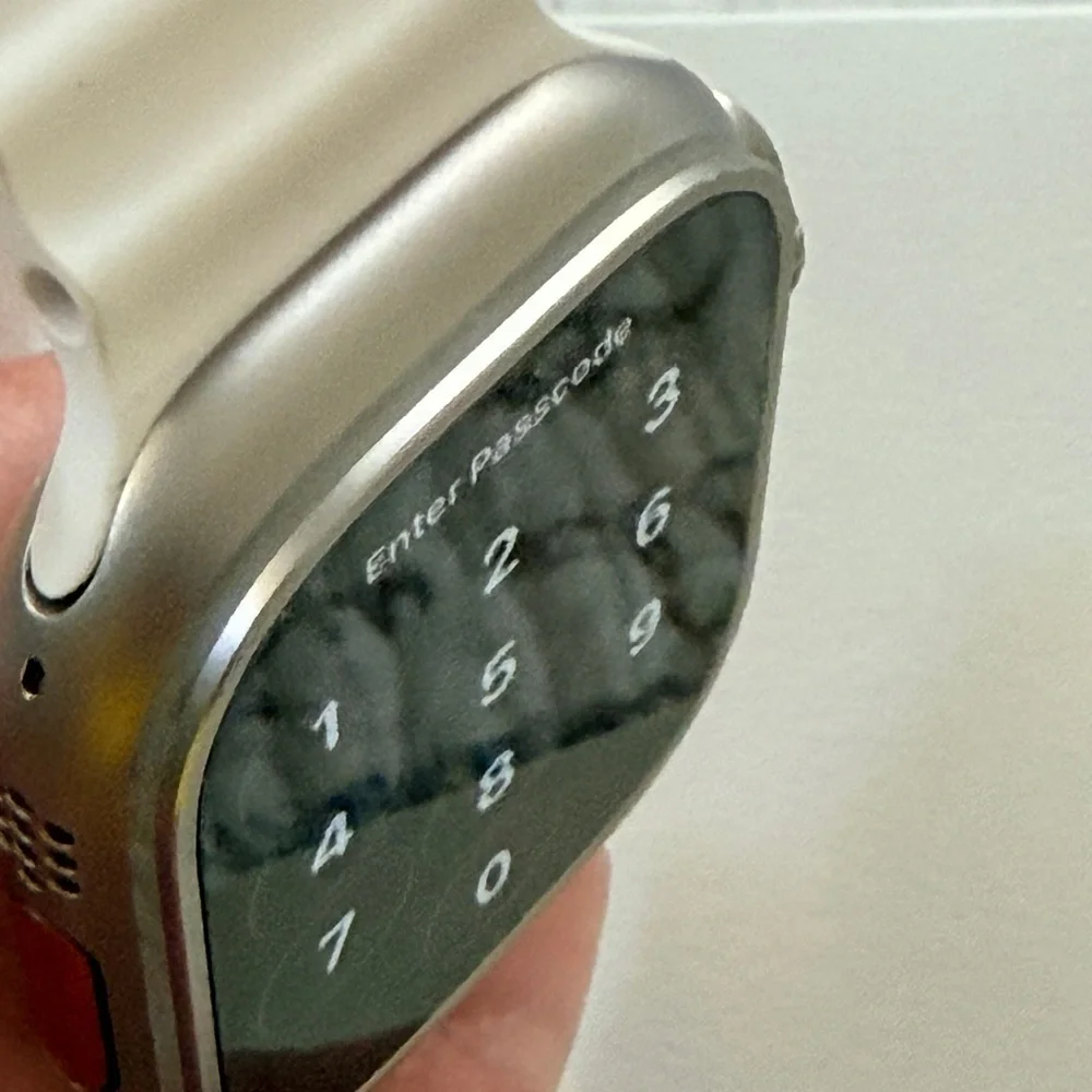 Apple Watch Ultra 1st Gen Smartwatch with White, Orange, and Yellow Bands